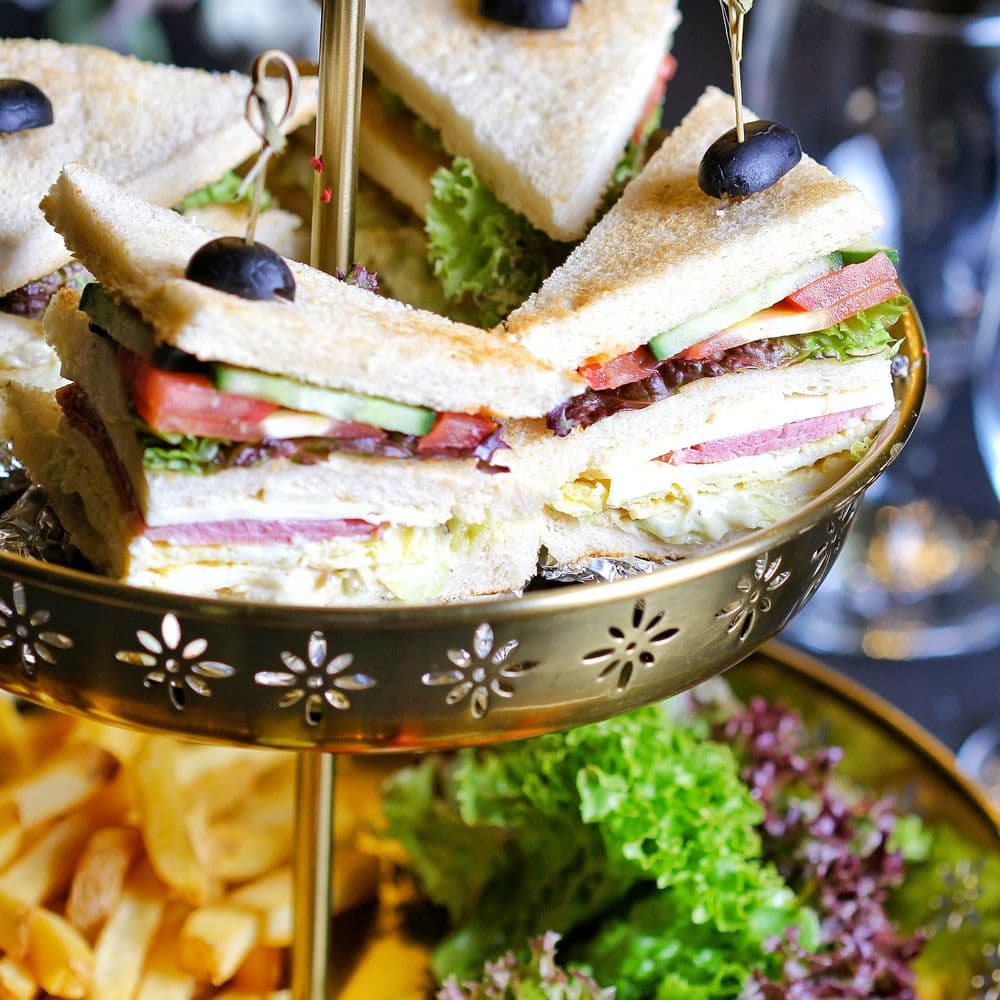 The Club: Roast turkey, smoked bacon, tomato, gem lettuce, black pepper mayo.